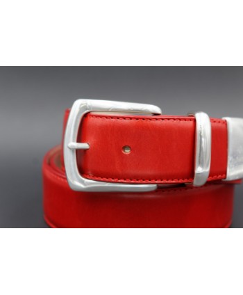 Red leather belt with nickel end cap - buckle detail