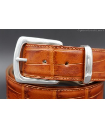 Cognac crocodile-style leather belt with full metal tip - detail