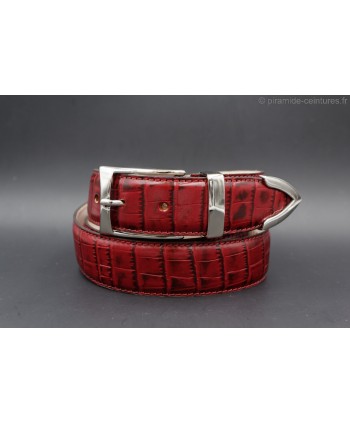 Burgundy croco-style leather belt with metallic tip