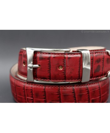 Burgundy croco-style leather belt with metallic tip - buckle detail