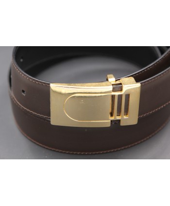 Reversible belt in black and brown leather with golden case - brown side - detail